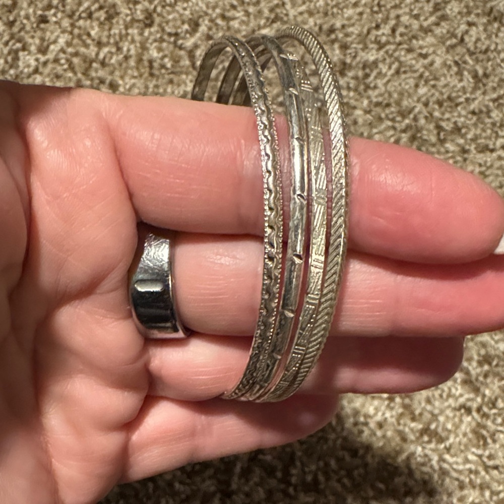 Set of 4 different designs silver-tone metal bangle bracelets - EUC!